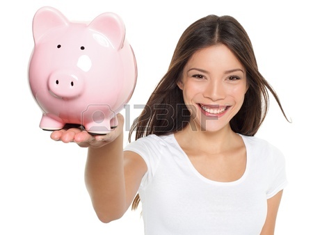 stock photo girl with piggy bank